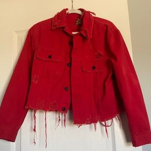 Distressed red denim jacket